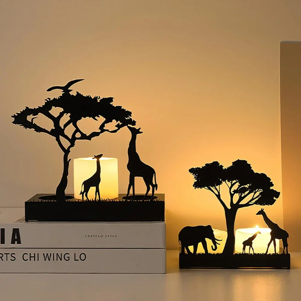 Safari Silhouette decorative candle holders with elephant and giraffe designs.