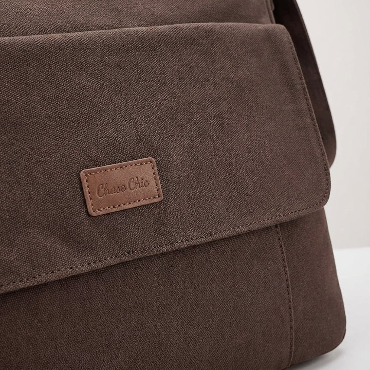 Unisex lightweight laptop shoulder bag, sleek design, ideal messenger bag for professionals & students.