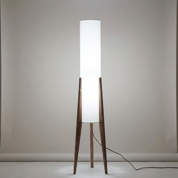 Ambient LED floor lamp, Scandinavian design, creating cozy lighting for living room & home decor.