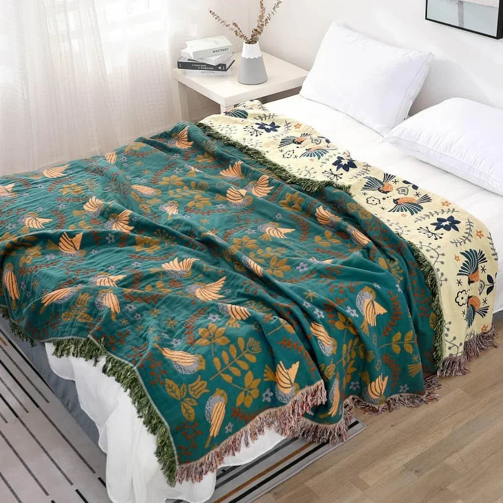 Scandinavian bird pattern reversible cotton blanket for nordic home decor.
