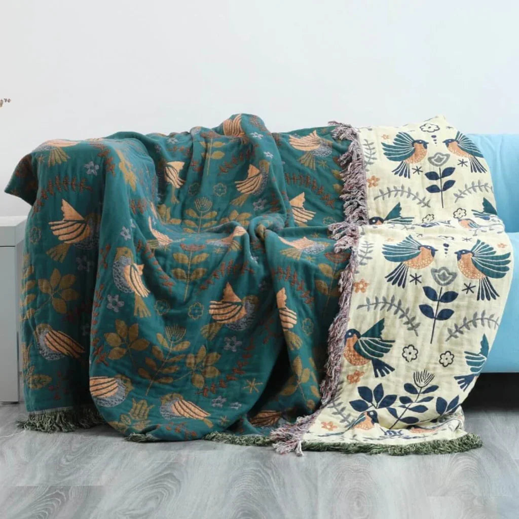 Machine washable reversible cotton bird blanket, elegant Scandinavian nature inspired textile.