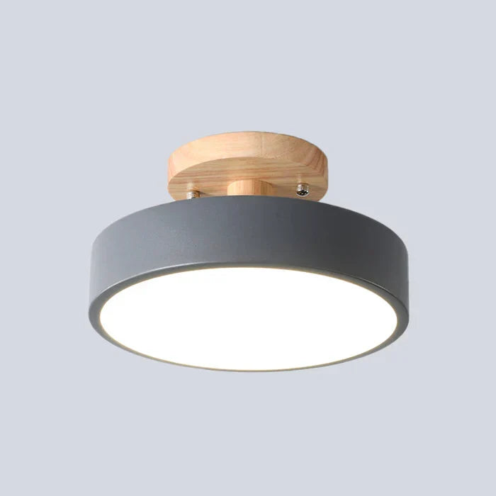 Elegant Scandinavian NordWood LED ceiling light, wood finish, ideal for modern home decor.