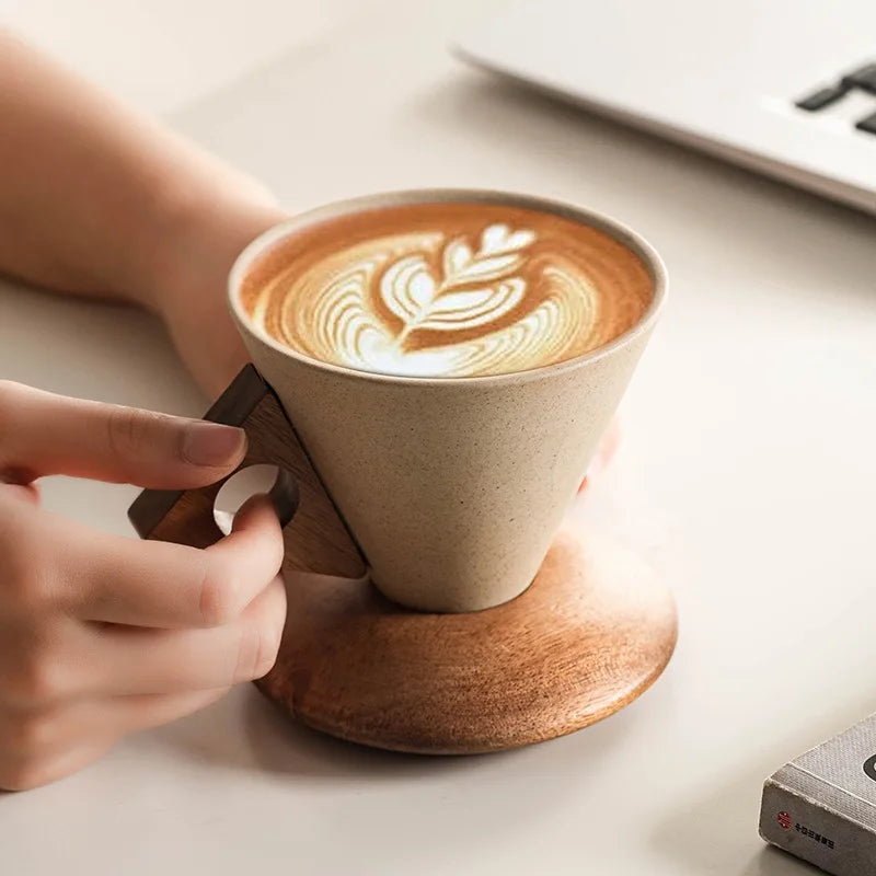 Modern ceramic cone mug set, sculptural design, ideal for coffee or tea. Stylish kitchenware & home decor.