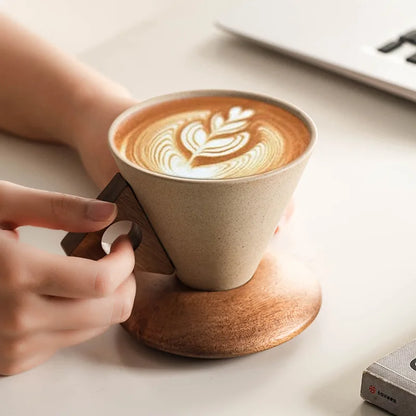 Modern ceramic cone mug set, sculptural design, ideal for coffee or tea. Stylish kitchenware & home decor.