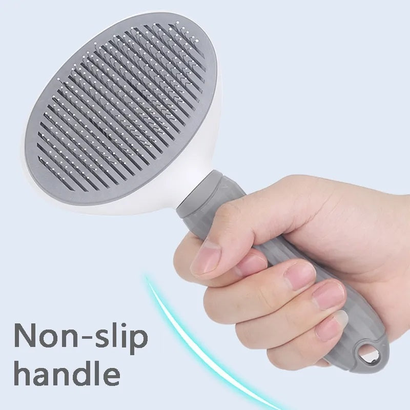 Hand demonstrates the self-cleaning pet brush feature. Easy fur removal for dogs & cats. Pet care essential.