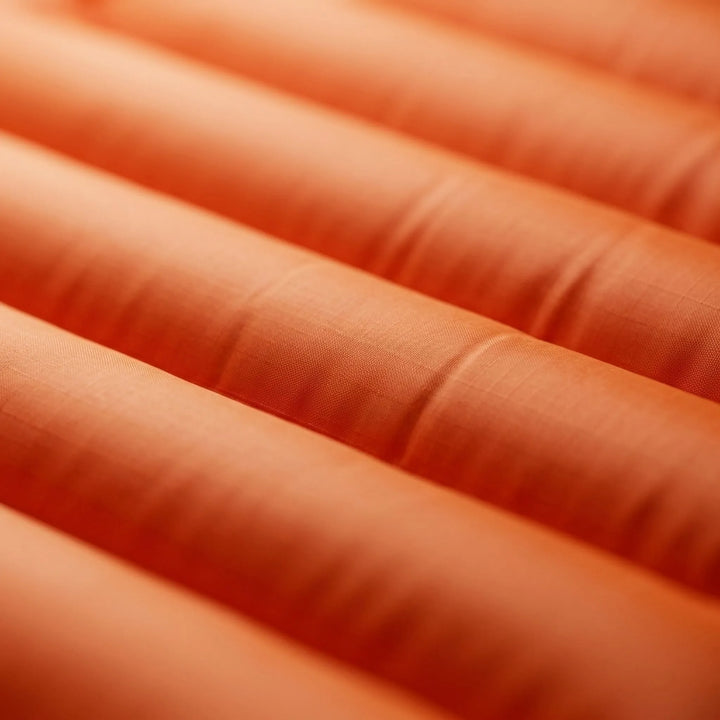 Elevated comfort camping sleeping pad. Self-inflating for easy setup; essential lightweight outdoor gear.