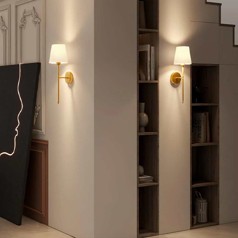 Cordless set of 2 fabric wall lights, battery-powered for versatile home lighting. Bulbs included.