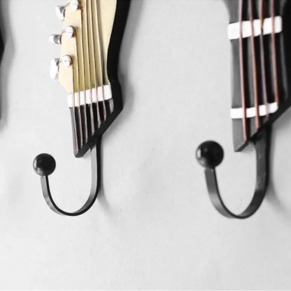 Stylish guitar-shaped wall hooks (set of 3) for entryway keys, coats, or creative home decor.