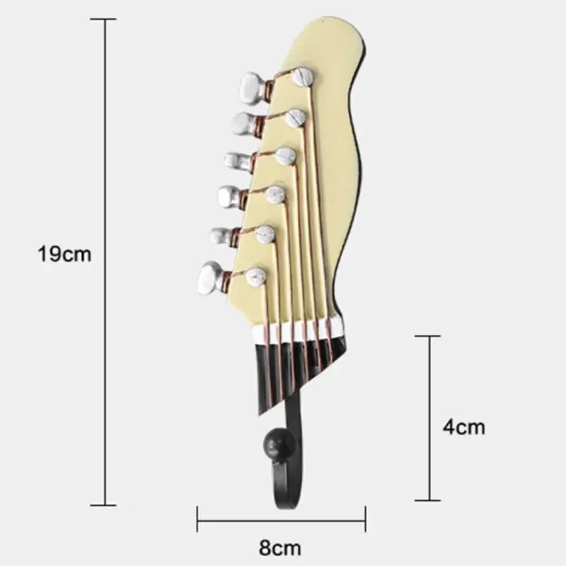 Decorative set of 3 guitar wall hooks for musical home decor, organization, and entryway key holding.