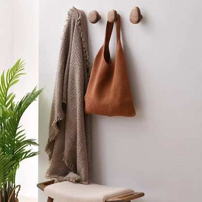 Set of 4 natural wood pebble wall hooks for coats, towels & home organization. Organic solid wood.