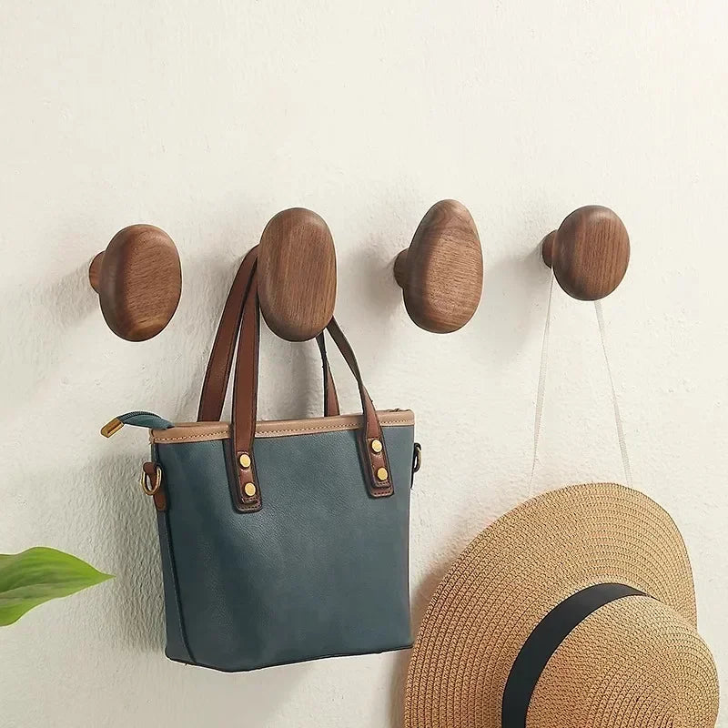 Organic pebble design solid wooden wall hooks. Natural wood coat & towel hooks for modern home decor.
