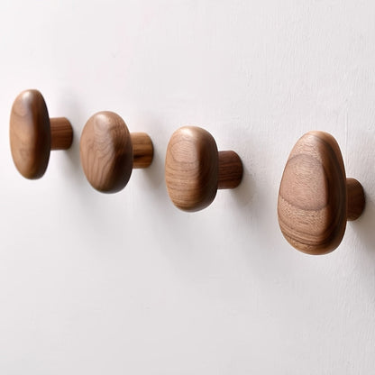 Elegant natural wood pebble wall hooks. Solid wood coat & towel hooks for any room's decor.