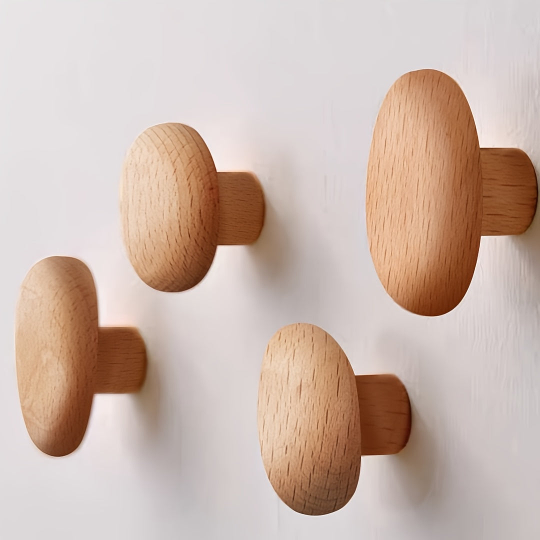 Eco-friendly set of 4 organic pebble wooden hooks. Versatile wall hooks for coats, towels & decor.