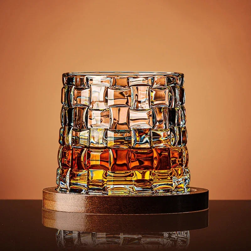 Set of three premium crystal whiskey glasses for bourbon, scotch, and spirits. Luxury barware for home bar.