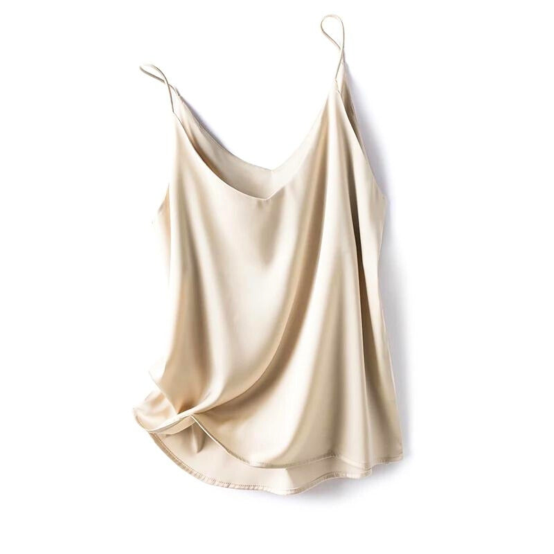 Close-up of a women's silky smooth camisole, highlighting its elegant fabric and versatile layering appeal.