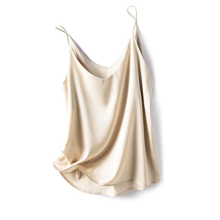 Close-up of a women's silky smooth camisole, highlighting its elegant fabric and versatile layering appeal.