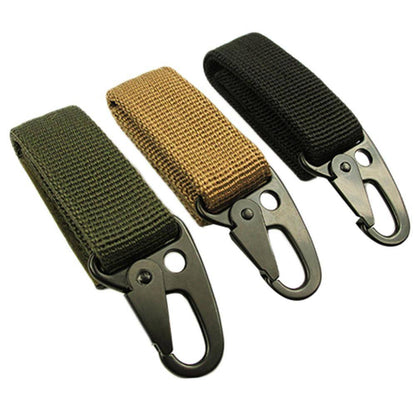 Silver tactical carabiner hook attached to a backpack, ideal for outdoor gear & camping.