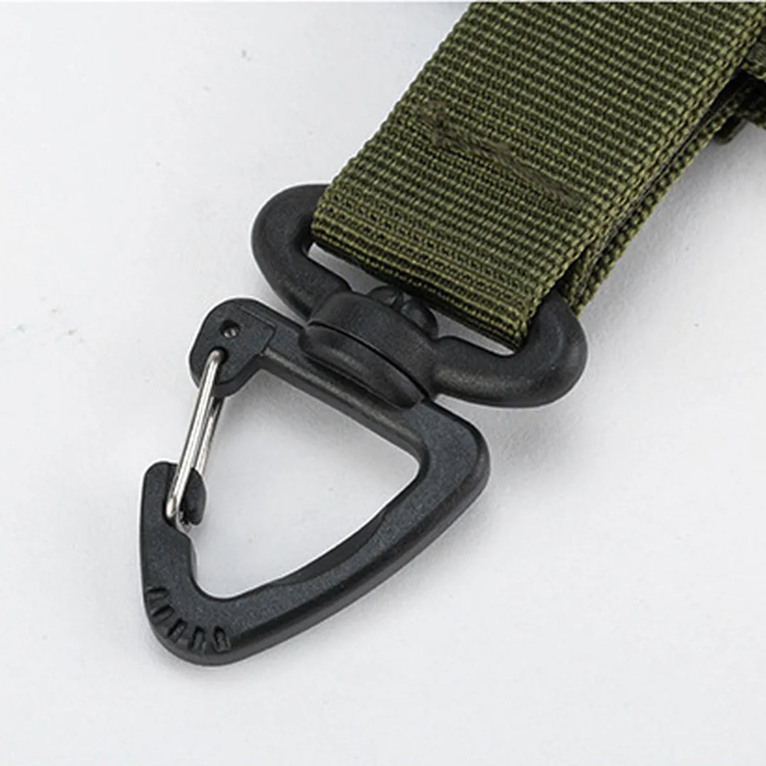 Tactical glove holder clip in tan, perfect for securing gloves, cables, or other outdoor gear to a belt or molle.