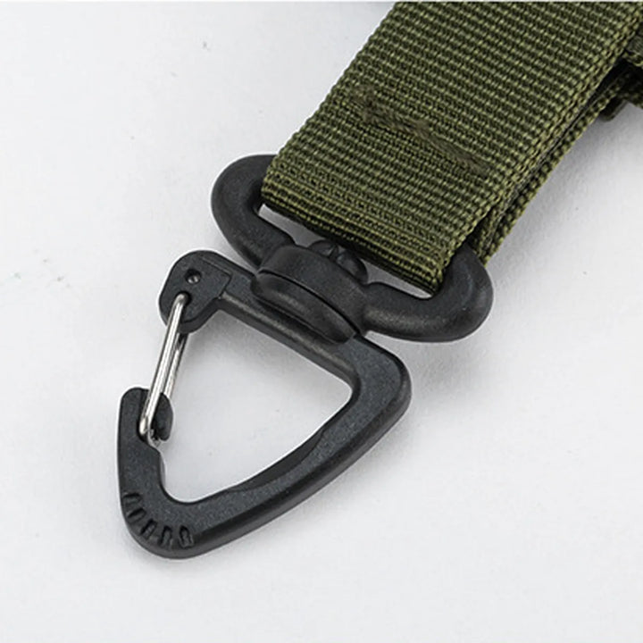 Tactical glove holder clip in tan, perfect for securing gloves, cables, or other outdoor gear to a belt or molle.