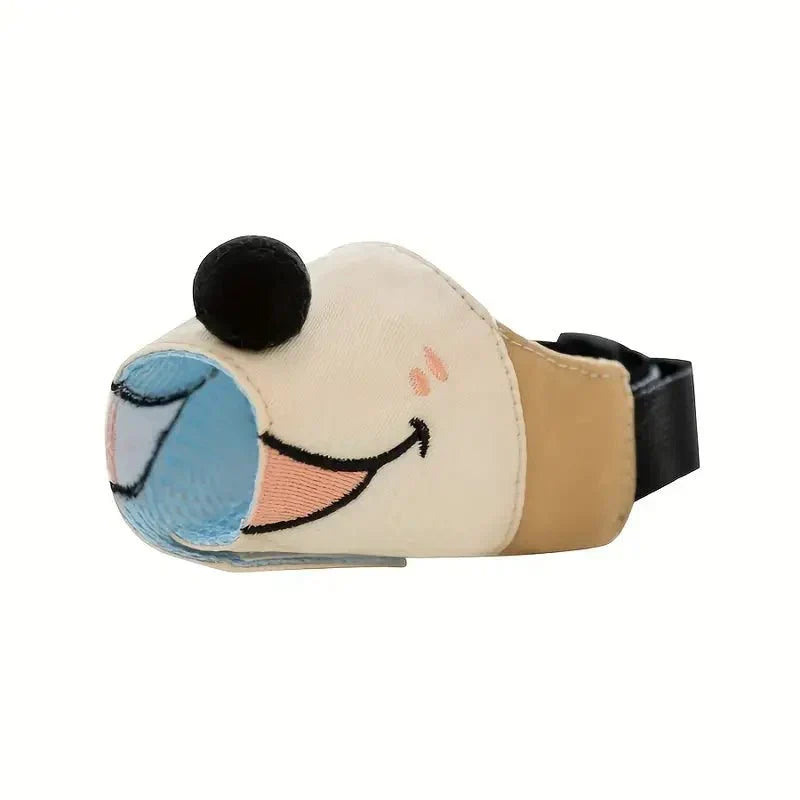 Safe & adjustable dog muzzle with cartoon design, ideal for training small to large dogs. Breathable pet accessory.