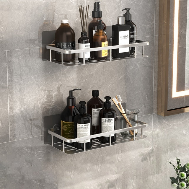 Contemporary silver metal suction caddy, perfect for keeping shower essentials within reach.