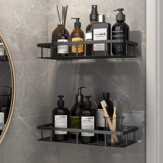No-damage black metal shower shelf, suction cups provide secure grip on smooth surfaces.