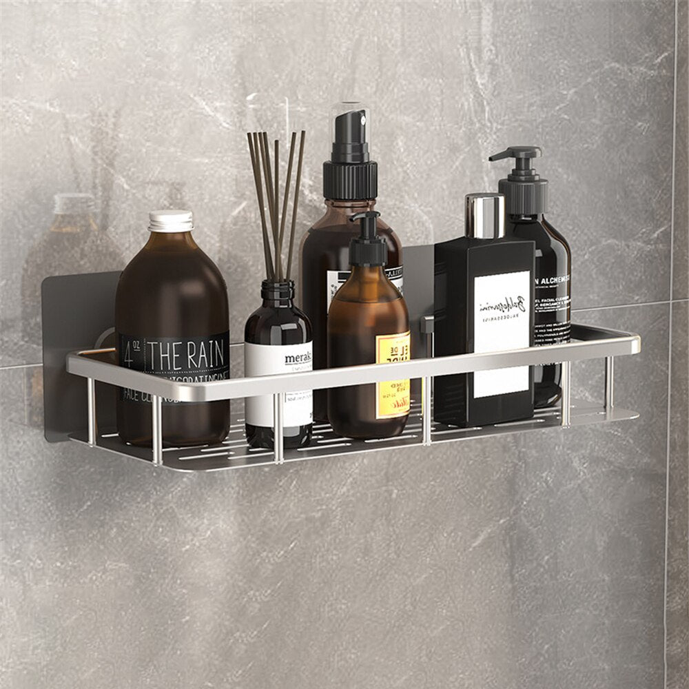 Modern silver suction cup shower caddy, rust-resistant metal for elegant bathroom storage.