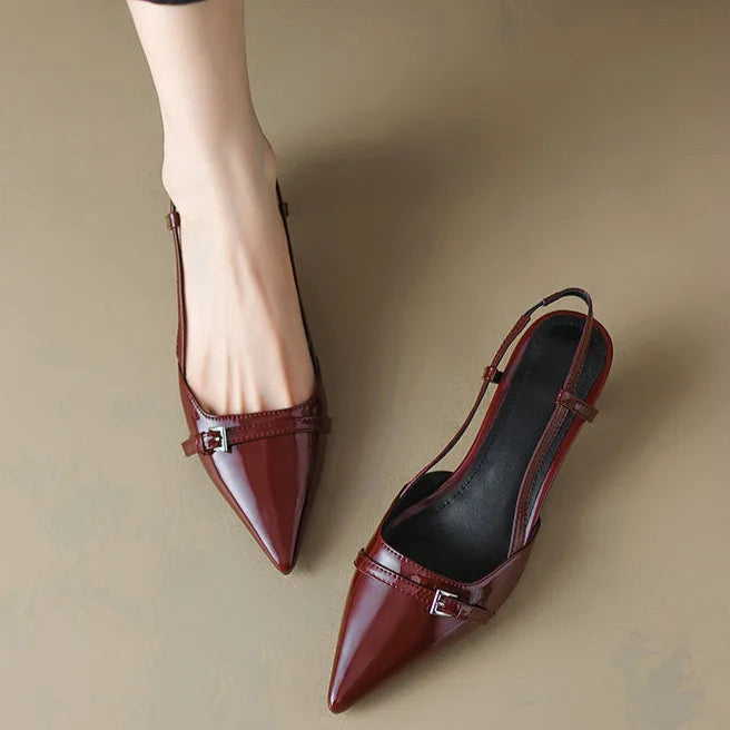 Comfortable low heel black pointed toe kitten heels for women, ideal for formal dress.