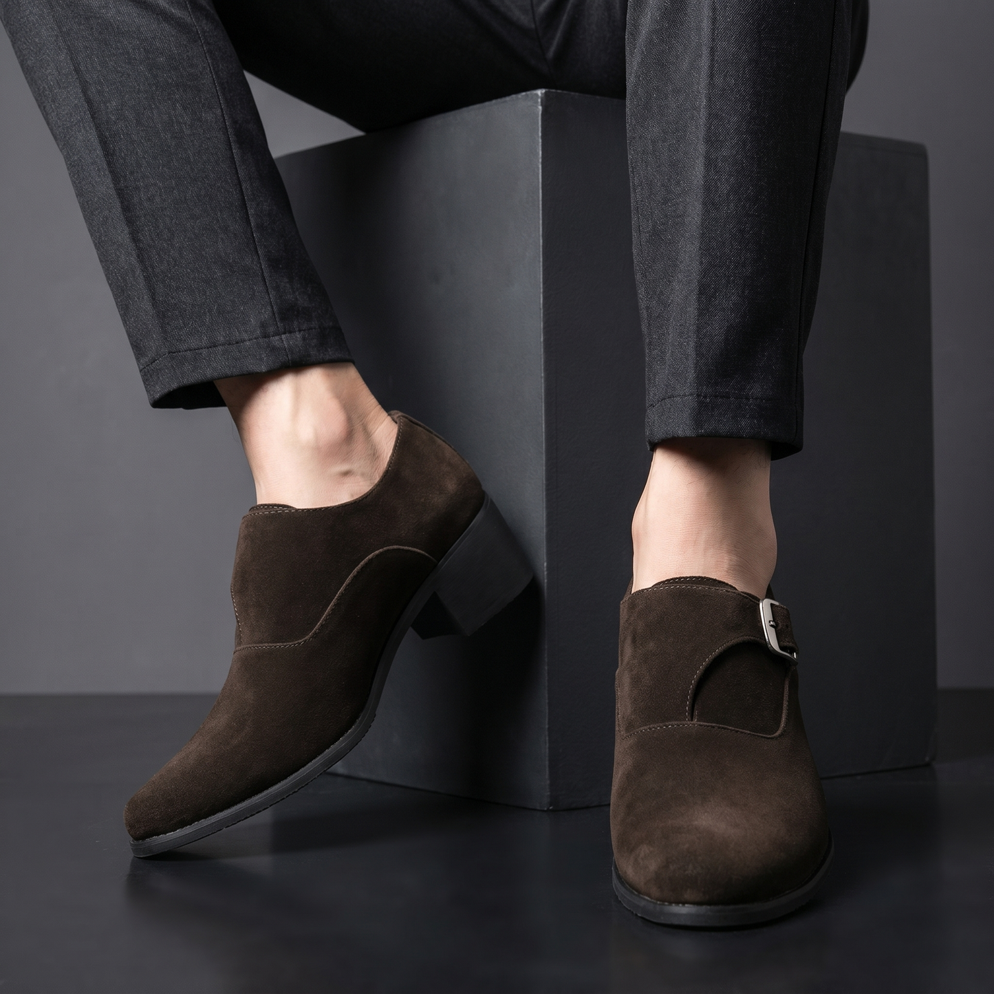 Stylish black men's slip-on loafers, perfect dress shoes for formal events or elegant casual outfits.
