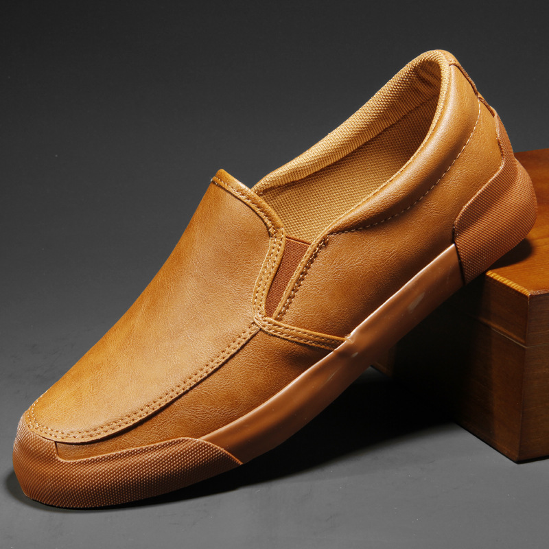Sleek men's Chelsea slip-on sneakers for effortless modern everyday style and comfort.