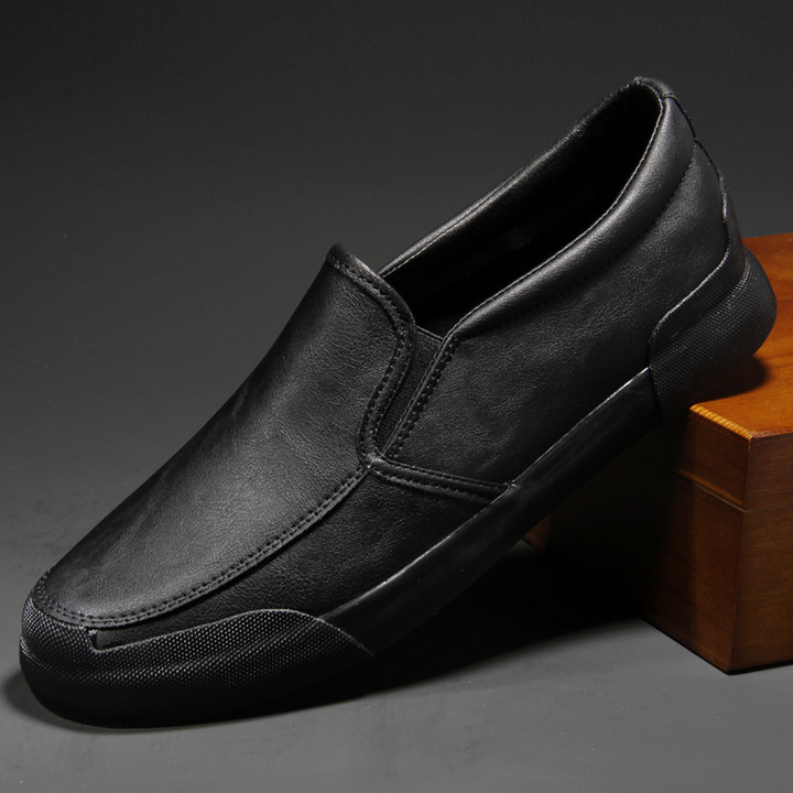 Modern men's Chelsea slip-on sneakers, designed for sleek fashion, durability, and everyday comfort.