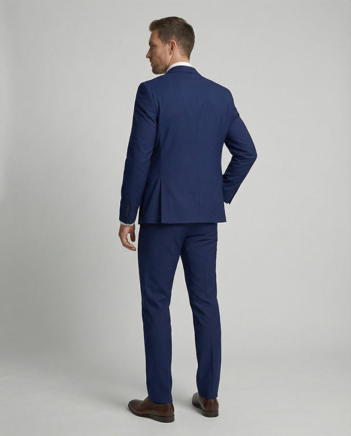 Elegant men's three-piece wedding suit, a sophisticated formal outfit for grooms and special events.
