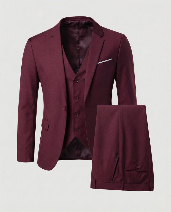 Stylish men's formal three-piece suit, featuring a modern cut for business and wedding elegance.