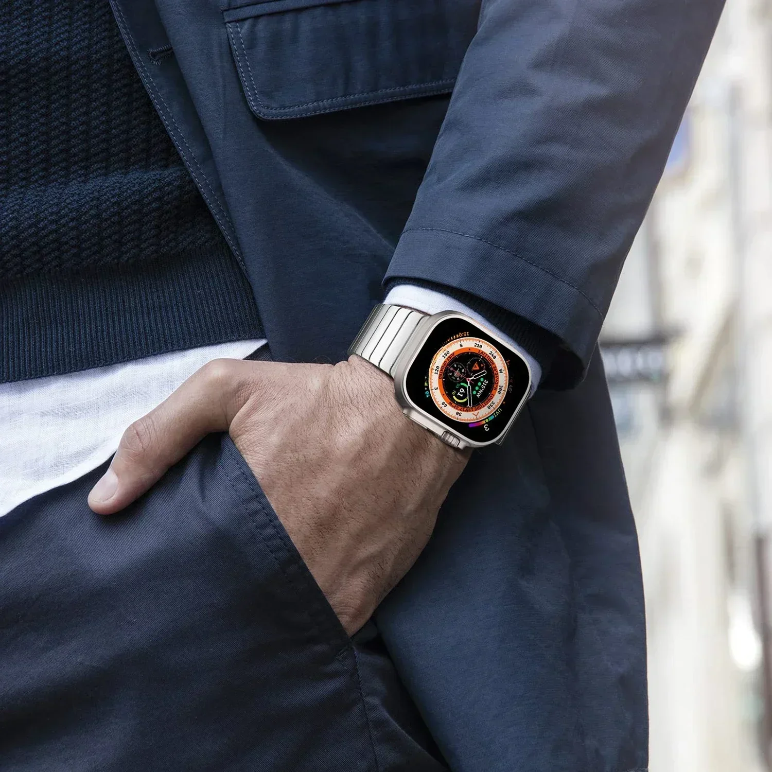 Close-up of premium men's stainless steel smartwatch band, highlighting its brushed finish and secure clasp.