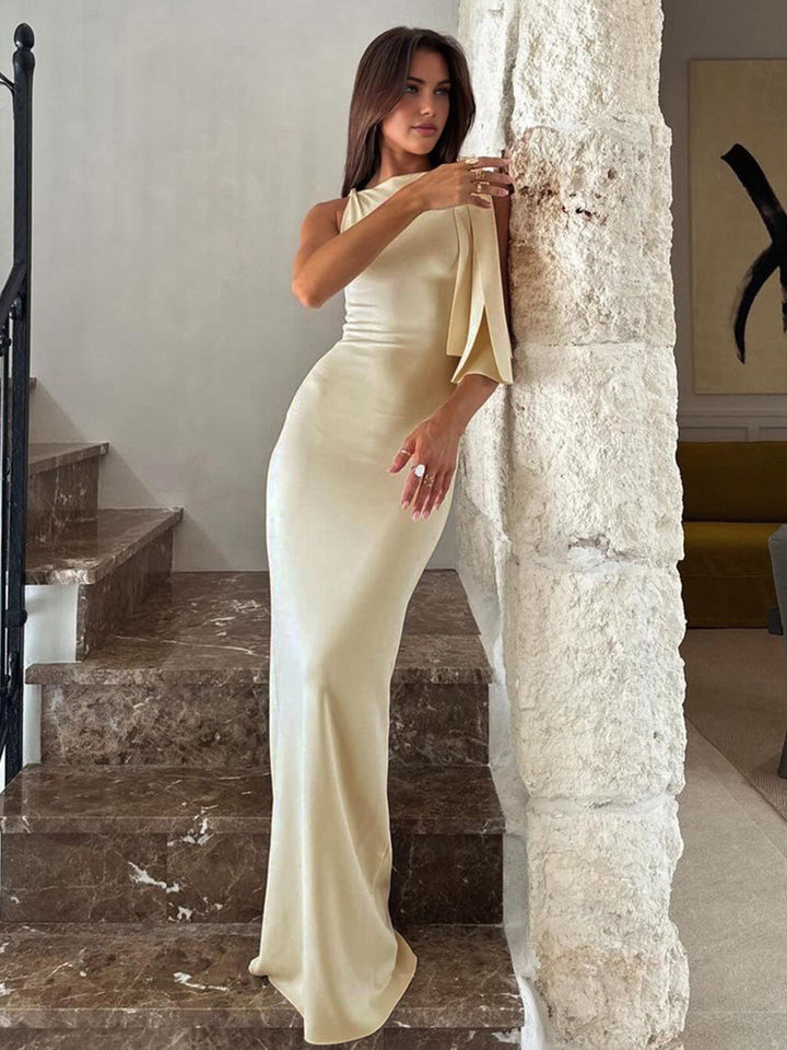 Elegant women's satin evening gown, off-white, ideal long formal dress for a wedding guest or special occasion.
