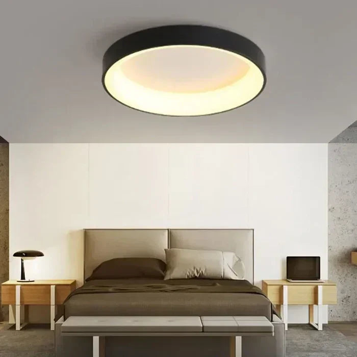 Energy-efficient round LED ceiling light with a sleek, modern design. Ideal for Scandinavian decor & home illumination.