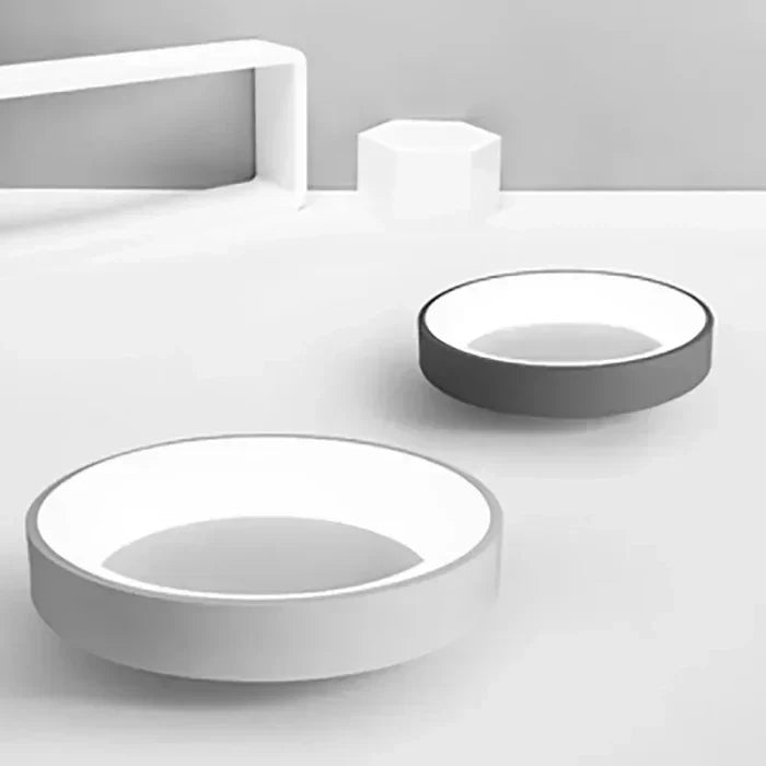Modern round LED ceiling light, NordicGlow design. Energy-efficient flush mount lamp for minimalist living spaces.