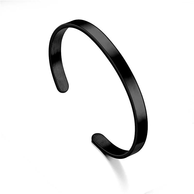 Black stainless steel cuff bracelet with a sleek minimalist design, ideal unisex jewelry.