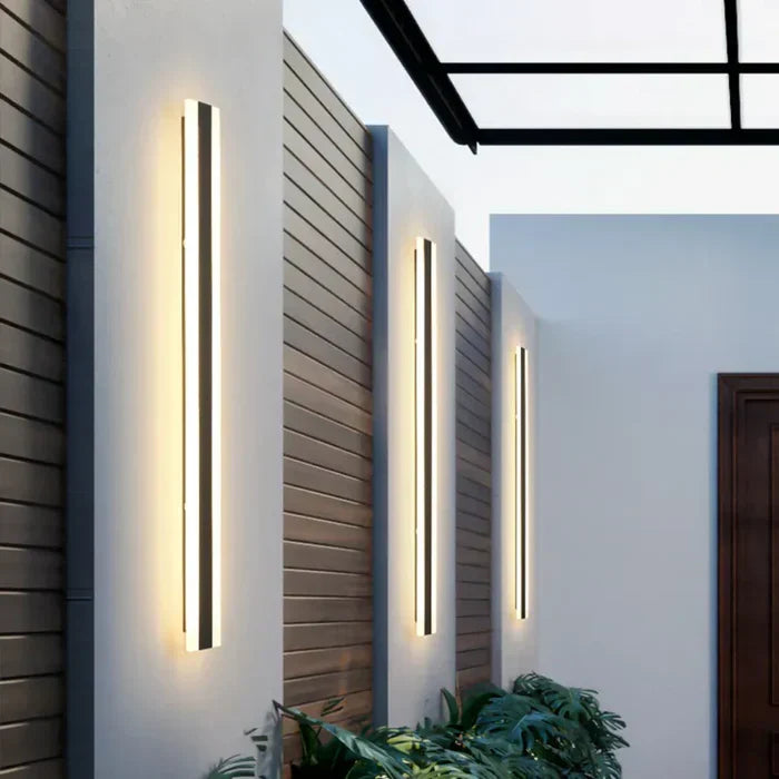 Modern outdoor wall lamp, RainGuard Light, designed for durable exterior lighting on patios and garden walls.