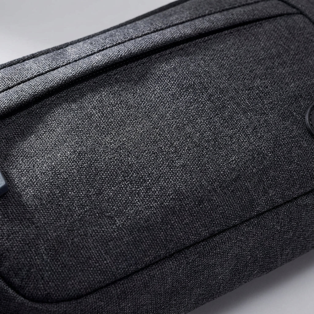 Durable, slim waterproof fanny pack for secure storage of phone & keys during hiking, sports, or travel.