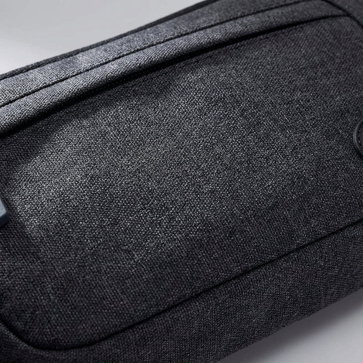 Durable, slim waterproof fanny pack for secure storage of phone & keys during hiking, sports, or travel.
