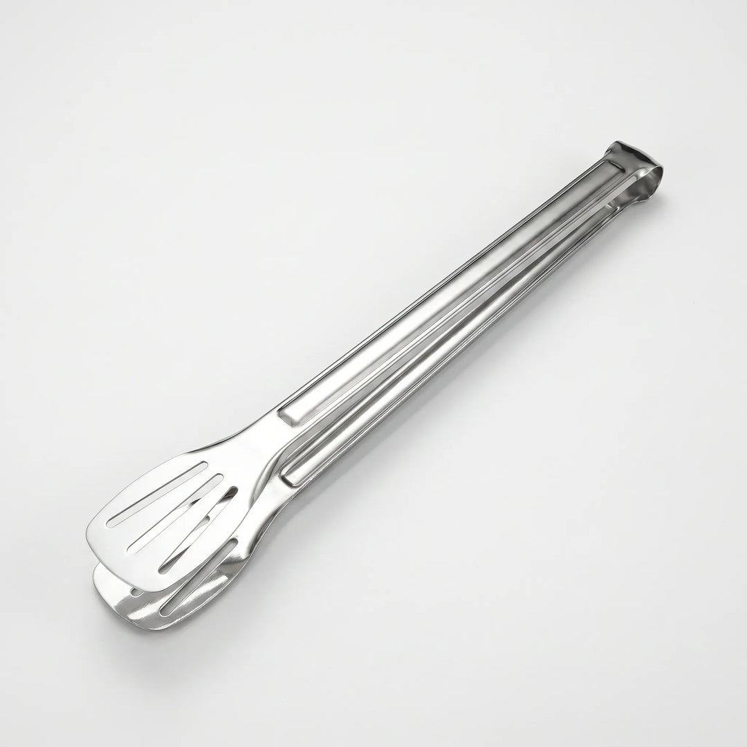 High-quality slotted stainless steel grilling tongs, essential kitchen tool for all home cooks.