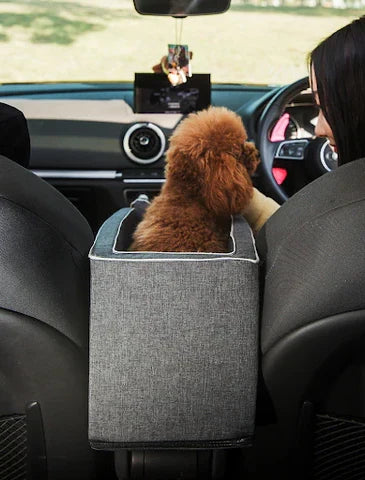 Secure pet travel bag & booster for small dogs/cats, fits car armrests for elevated comfort.