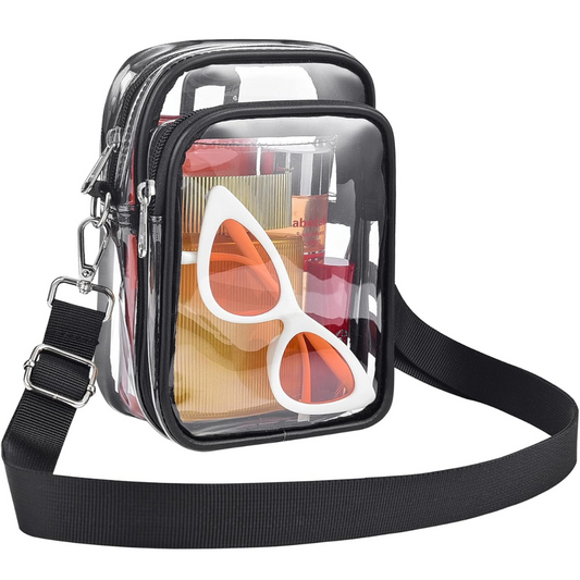 Small transparent PVC crossbody handbag for women with an adjustable strap.