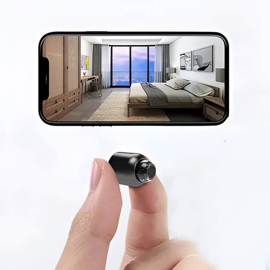 Small WiFi camera with night vision for discreet home security.