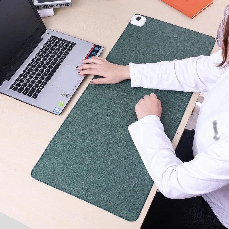 Smart heated mouse pad with adjustable temperature control for warm hands & comfortable work.