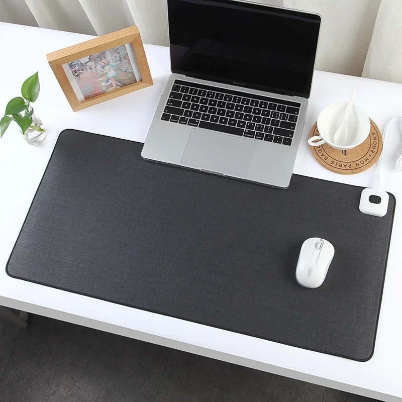 Boost productivity with a smart heated mouse pad. Adjustable temperature for a cozy, ergonomic workspace.