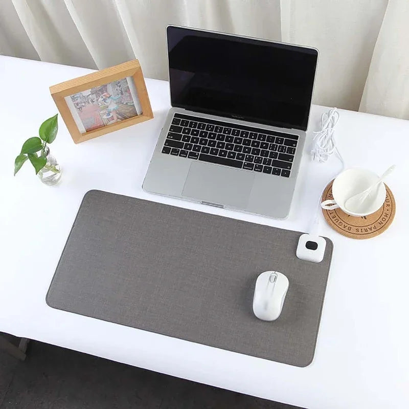 Home office heated mouse pad. Smart temperature control provides warmth & comfort for long work sessions.
