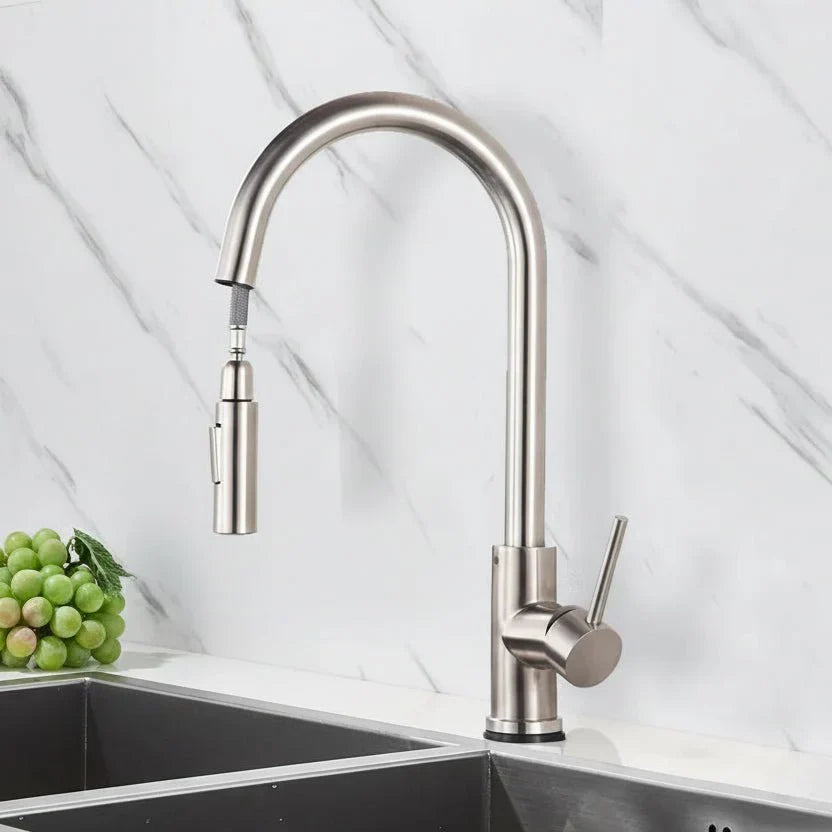 Smart kitchen faucet, stainless steel with touchless sensor & pull-out sprayer head. Modern home fixture.