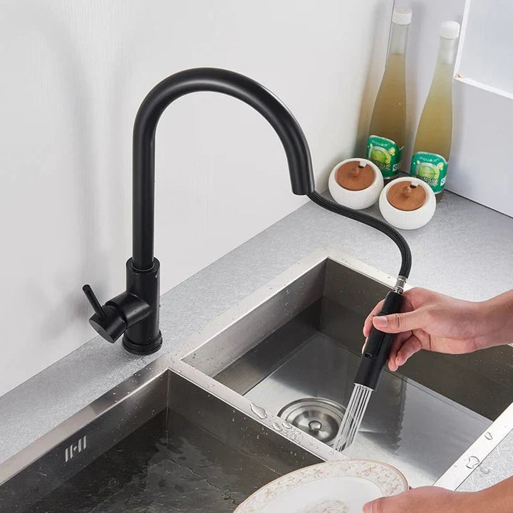 Sensor kitchen faucet with convenient pull-out sprayer. Touchless operation for a modern kitchen fixture.